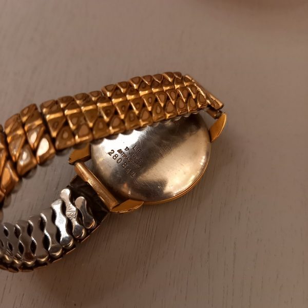 Montre Bracelet LIP 17 jewels antimagnetic Années 50, Vintage Dos en Acier inoxydable Bracelet métal doré élastique état de marche