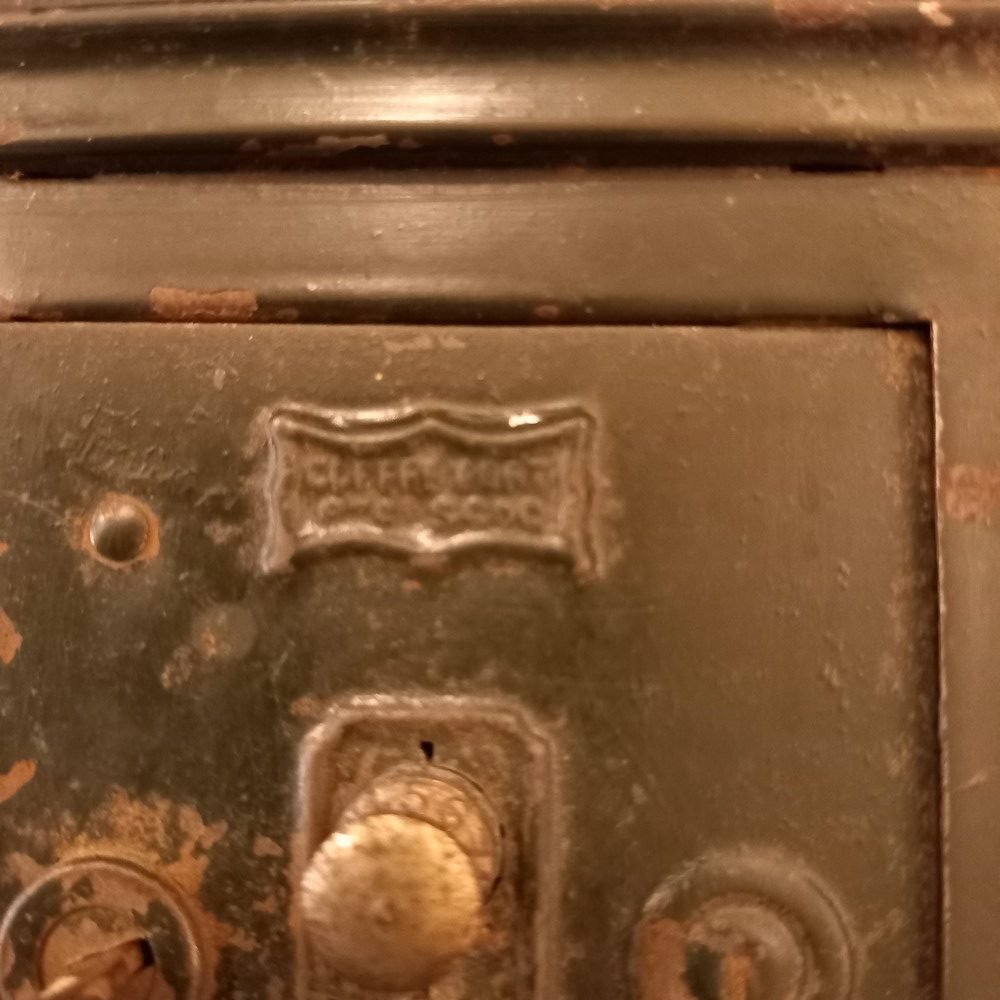 Tirelire en métal en forme de coffre-fort, avec sa petite clé